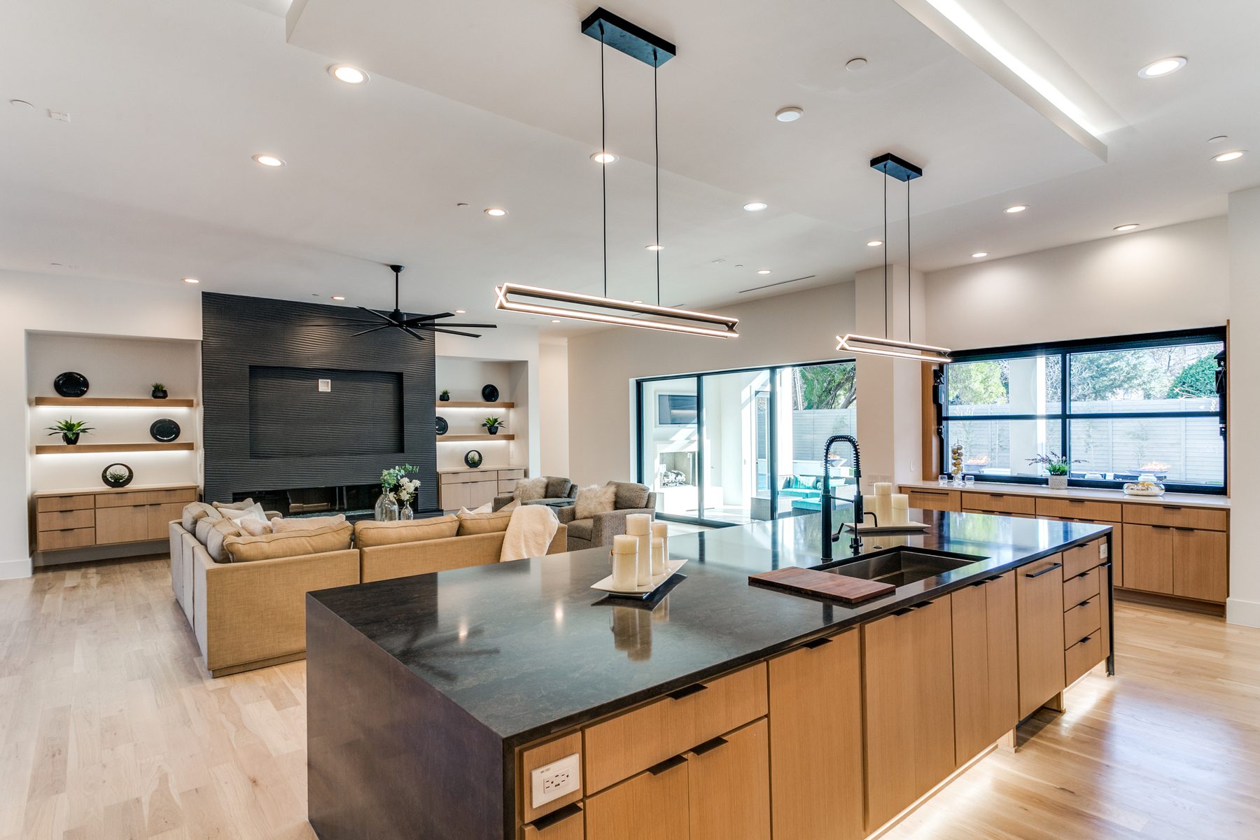 Kitchen, family room, and sliding doors to pool